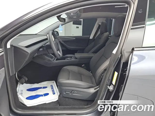 Tesla Model Y — Фото автомобиля 15