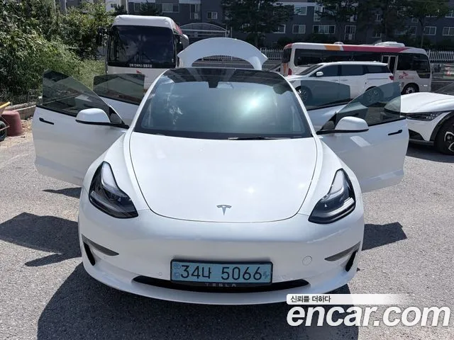 Tesla Model 3 — Фото автомобиля 11