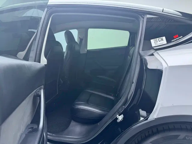 Tesla Model Y — Фото автомобиля 7