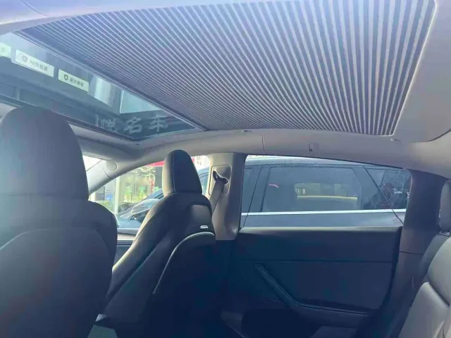 Tesla Model Y — Фото автомобиля 6