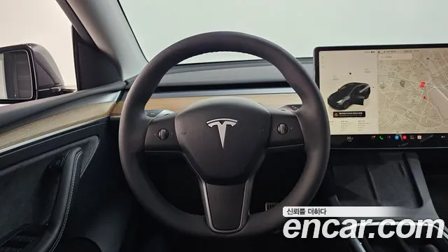 Tesla Model Y — Фото автомобиля 19