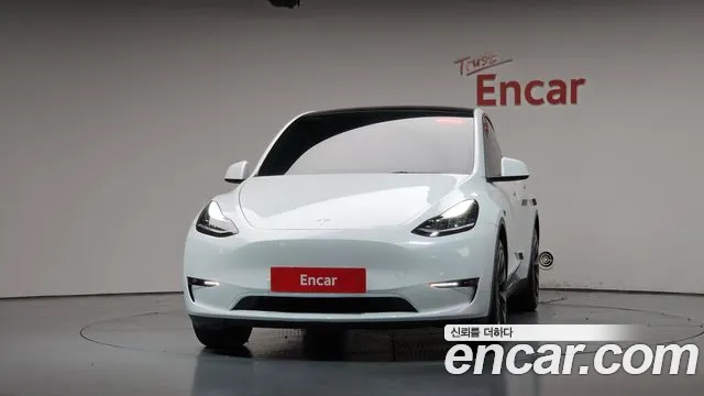 Tesla Model Y — Фото автомобиля 3