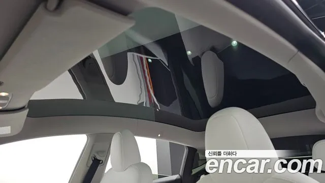 Tesla Model Y — Фото автомобиля 24