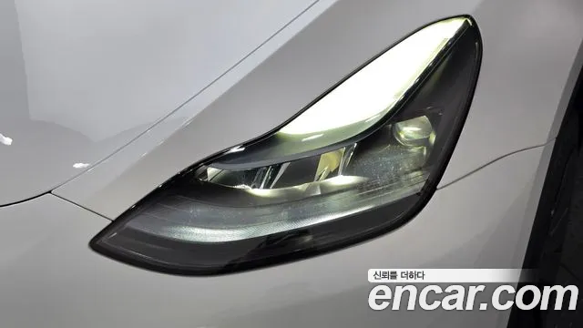 Tesla Model Y — Фото автомобиля 7