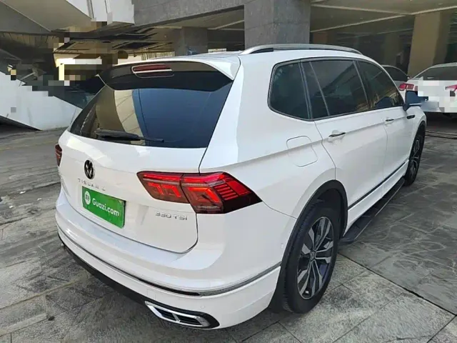 Volkswagen Tiguan L — Фото автомобиля 6