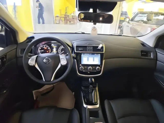 Nissan Tiida — Фото автомобиля 9