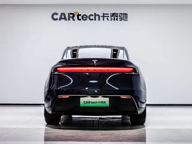 Tesla Model Y — Фото автомобиля 3