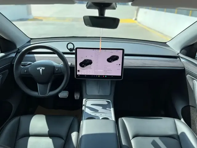 Tesla Model Y — Фото автомобиля 7
