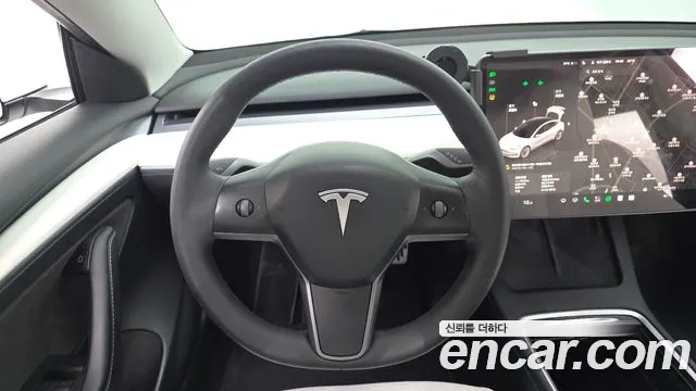 Tesla Model 3 — Фото автомобиля 21