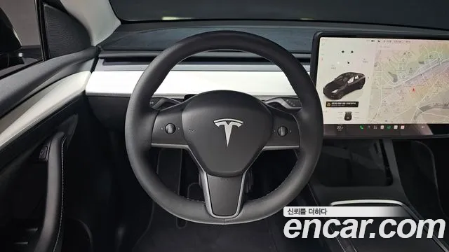 Tesla Model Y — Фото автомобиля 18