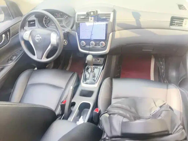 Nissan Tiida — Фото автомобиля 11