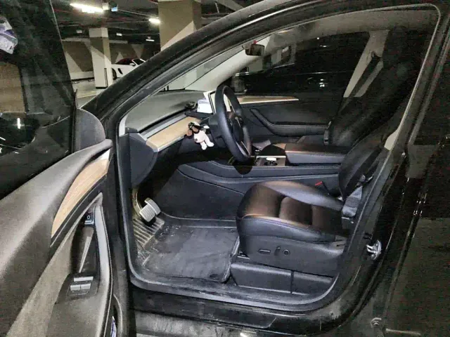 Tesla Model Y — Фото автомобиля 12