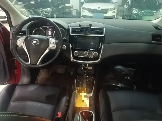 Nissan Tiida — Фото автомобиля 9