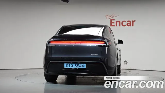 Tesla Model Y — Фото автомобиля 4