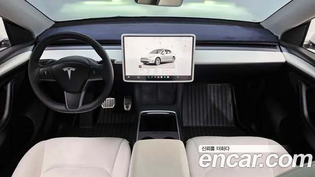 Tesla Model Y — Фото автомобиля 10