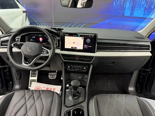 Volkswagen Tiguan L — Фото автомобиля 9