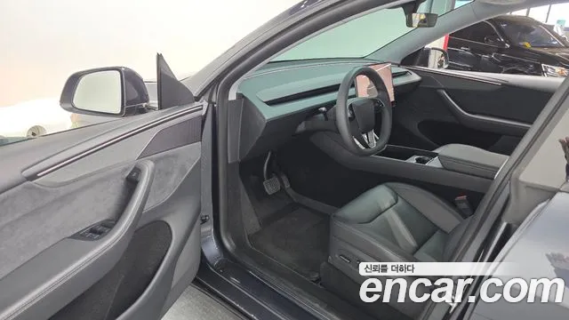 Tesla Model Y — Фото автомобиля 6