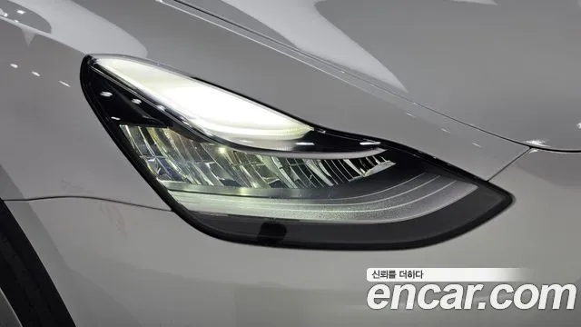 Tesla Model Y — Фото автомобиля 7