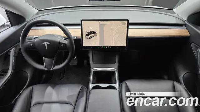 Tesla Model Y — Фото автомобиля 10