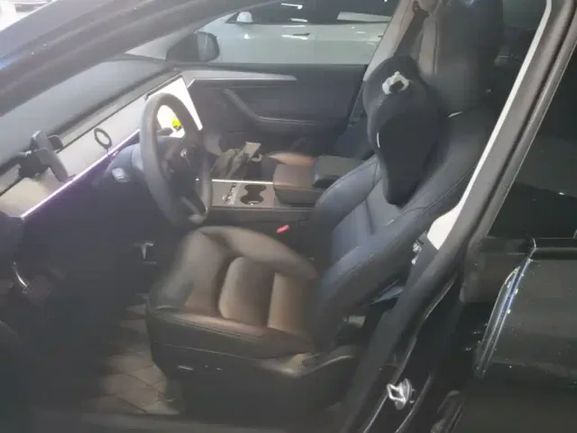 Tesla Model Y — Фото автомобиля 14