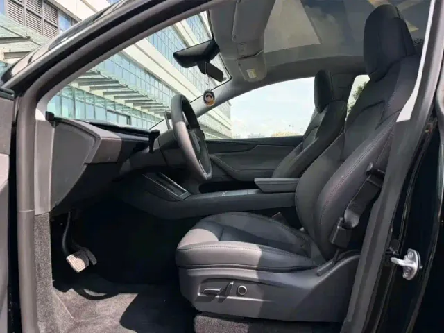 Tesla Model Y — Фото автомобиля 7