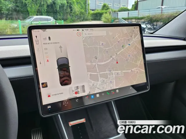 Tesla Model Y — Фото автомобиля 11