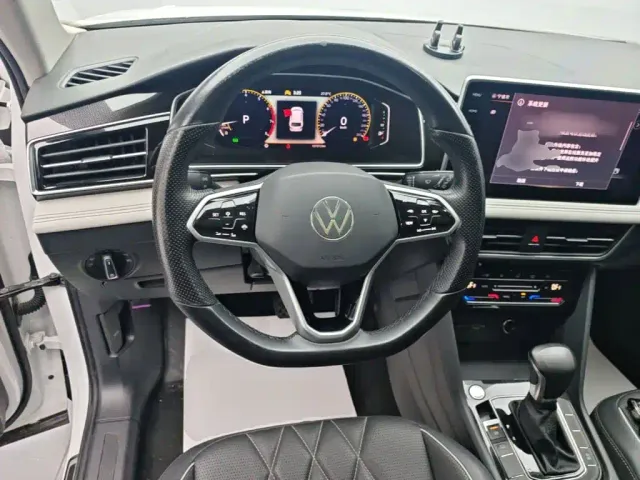 Volkswagen Tiguan L — Фото автомобиля 10