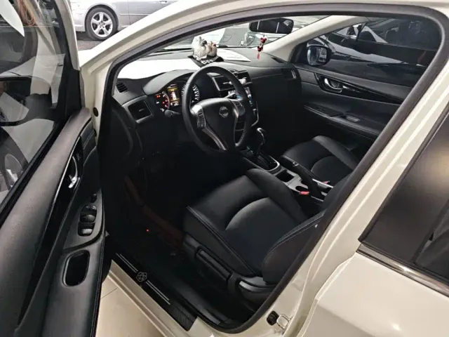 Nissan Tiida — Фото автомобиля 15