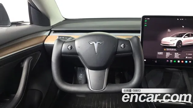 Tesla Model 3 — Фото автомобиля 19