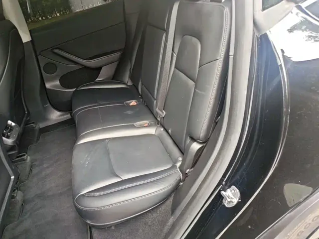 Tesla Model Y — Фото автомобиля 16