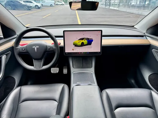 Tesla Model Y — Фото автомобиля 9