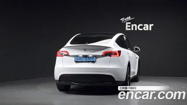 Tesla Model Y — Фото автомобиля 4