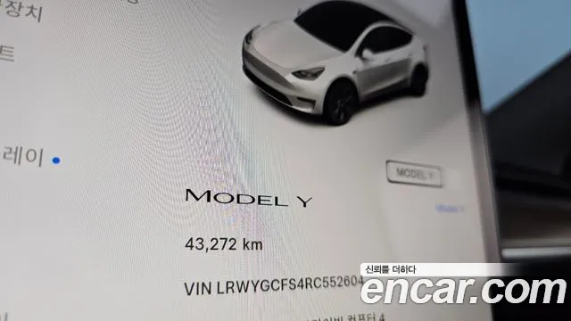Tesla Model Y — Фото автомобиля 8