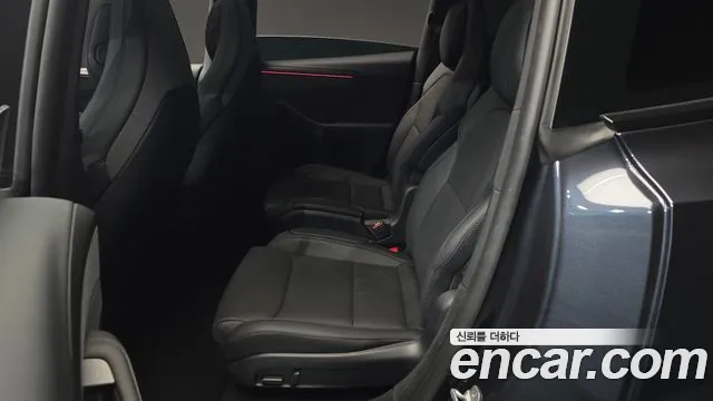 Tesla Model Y — Фото автомобиля 18
