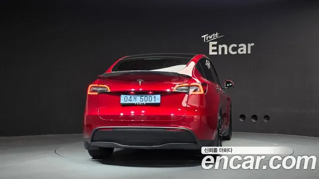Tesla Model Y — Фото автомобиля 4