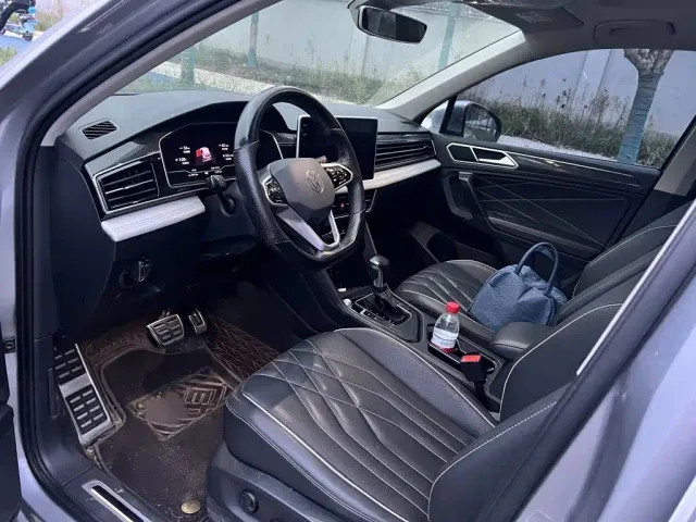 Volkswagen Tiguan L — Фото автомобиля 15
