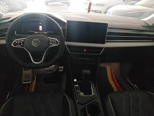 Volkswagen Tiguan L — Фото автомобиля 5