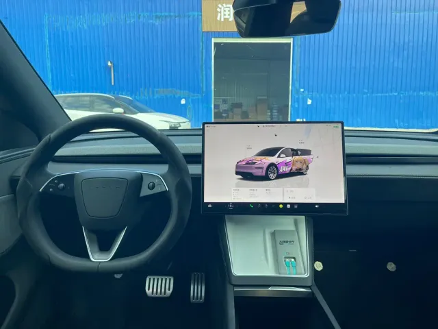 Tesla Model Y — Фото автомобиля 8