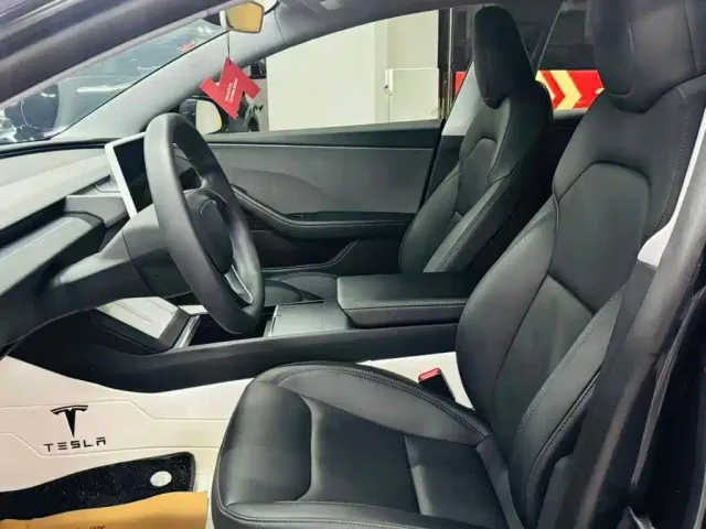 Tesla Model 3 — Фото автомобиля 7