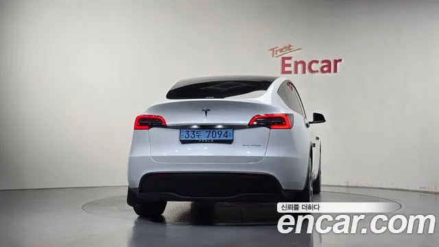 Tesla Model Y — Фото автомобиля 4