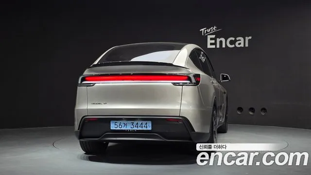 Tesla Model Y — Фото автомобиля 4
