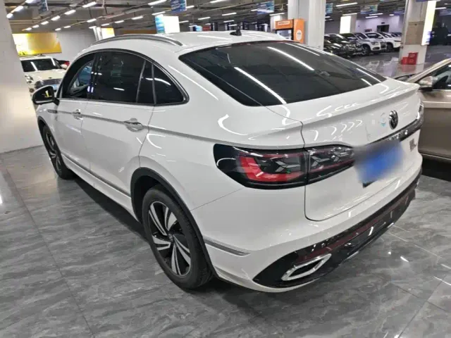 Volkswagen Tiguan X — Фото автомобиля 4