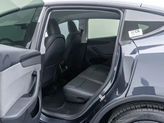 Tesla Model Y — Фото автомобиля 14