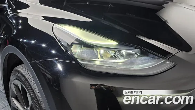 Tesla Model Y — Фото автомобиля 7