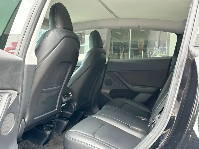 Tesla Model Y — Фото автомобиля 7
