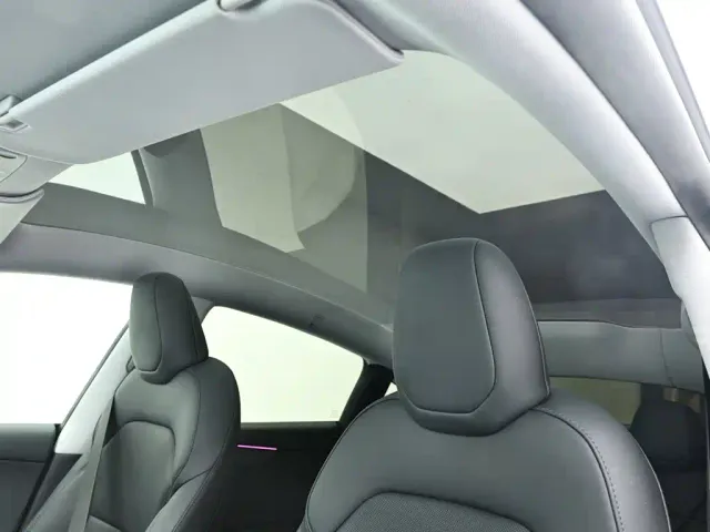 Tesla Model Y — Фото автомобиля 11