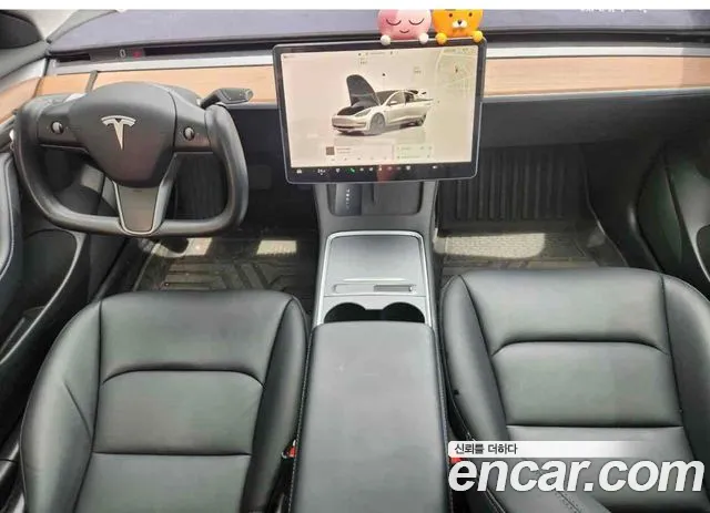 Tesla Model 3 — Фото автомобиля 7