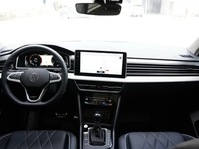 Volkswagen Tiguan L — Фото автомобиля 5