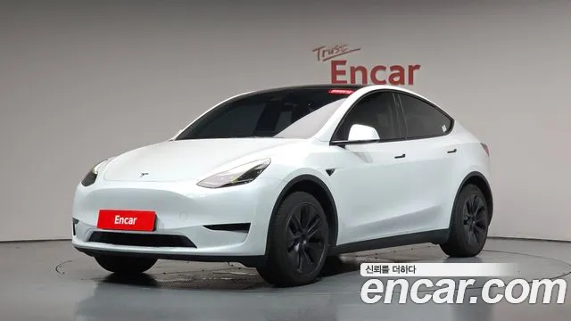Tesla Model Y — Фото автомобиля 3