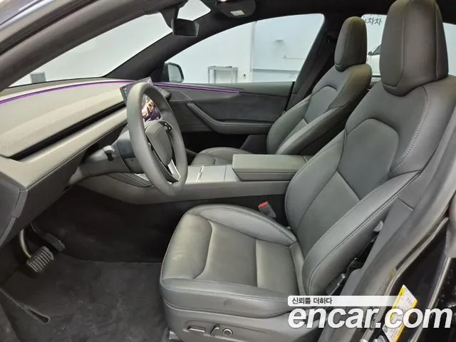Tesla Model Y — Фото автомобиля 11
